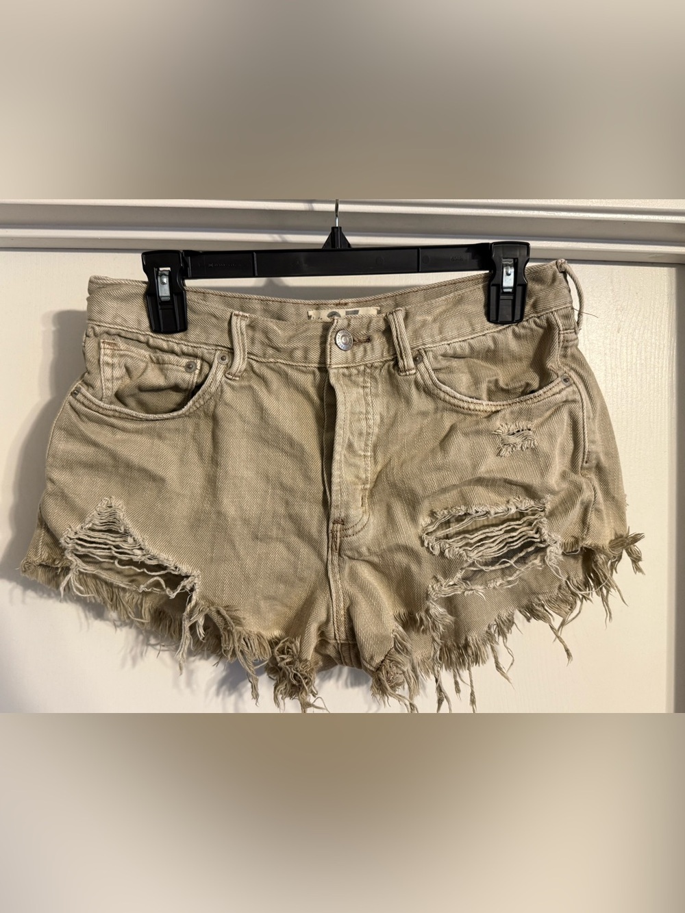 $68 MSRP We The Free Now or Never denim, button fly, cut off shorts size 27